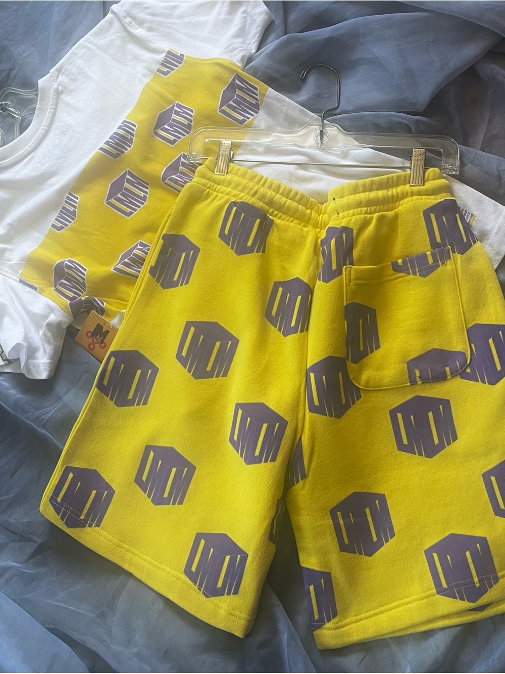 yellow graphic fleece sweat shorts Set-featuring an all-over purple cubic